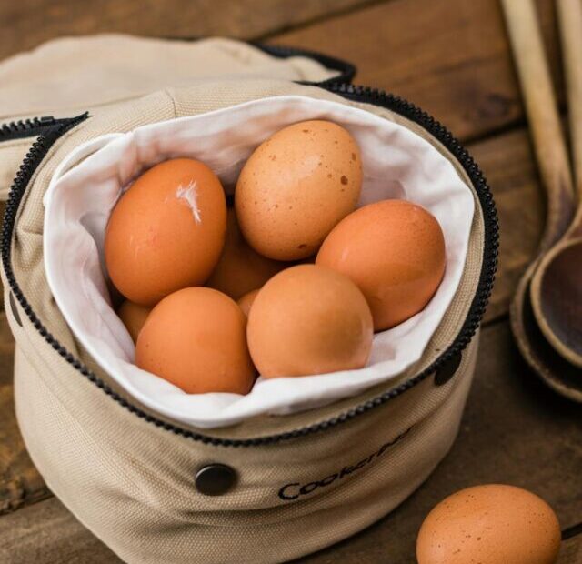 Beige Egg Inside a White Bag